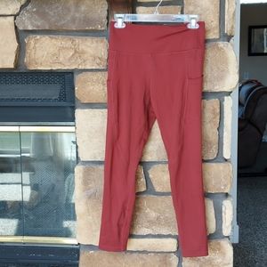 Zyia burnt orange leggings size 6-8